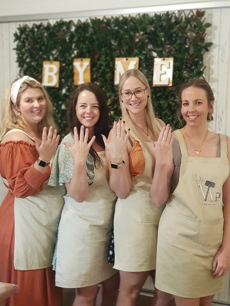 4 Besties showing off their handmade rings with proudly smile by the end of their Ring-Making Class at enchanted Jewellery-Making Workshop: ByMe Workshop, Brisbane.