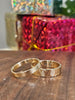 2 pieces of 9ct yellow Gold Rings, one with the engraving 'BYME' and the other with '2023' inside the rings